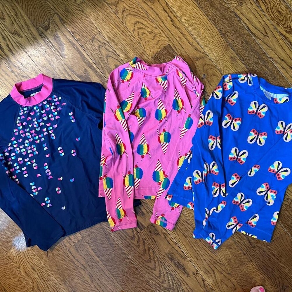 Hanna Andersson and Lands End multicoloured butterfly long sleeve swim shirt bun